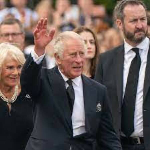 Who is the bearded man who is always with King Charles?