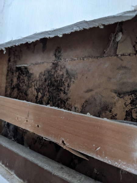 Is the white wall an asbestos dry wall?