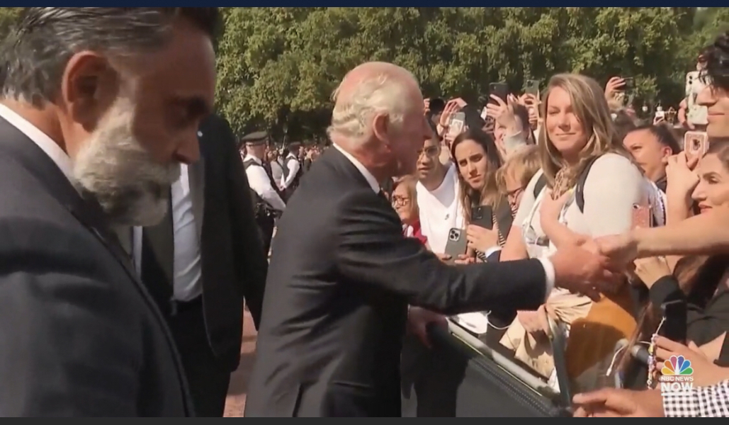 Who is the bearded man who is always with King Charles?