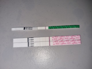 BFP or Evap on easy @ home 8DPO BFP slightly lighter next moeninf