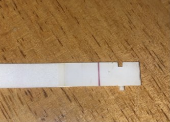 Am i crazy or is this possibly a positive preg test?