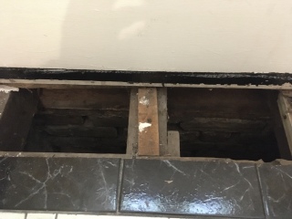 Damp wall/floor around bay window