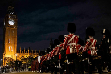 Who is overall in charge of the procession today?
