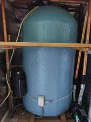 How does a hot water tank work?