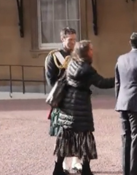 Who was that woman with Rishi Sunak just now at the palace?!
