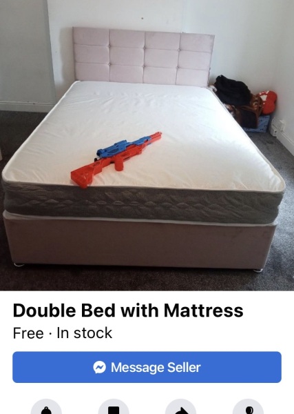 Bed and a plastic gun...