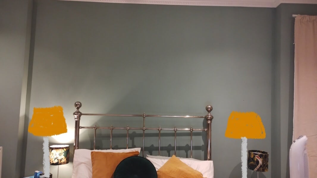 What do you have on the wall above your bed?