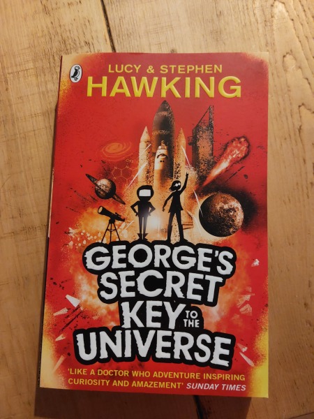 Fiction books for a 12 yr old about particle physics/anti matter sort of thing?