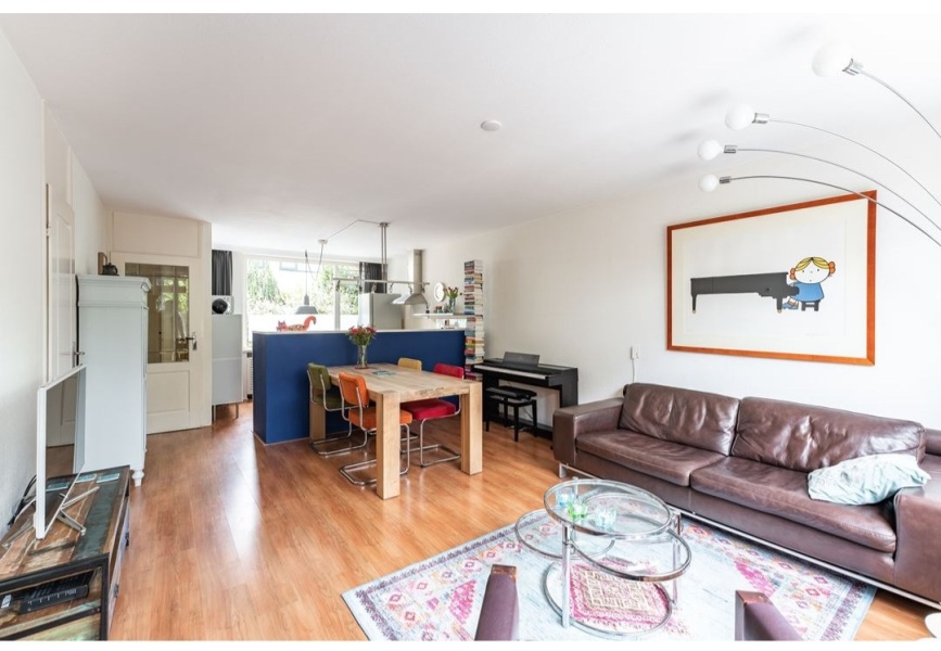 Putting a wall in open plan room to separate kitchen and lounge. 