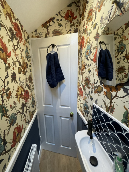 Struggling to decorate small (but high ceilinged) toilet room