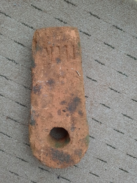 What is this brick with a hole in it?