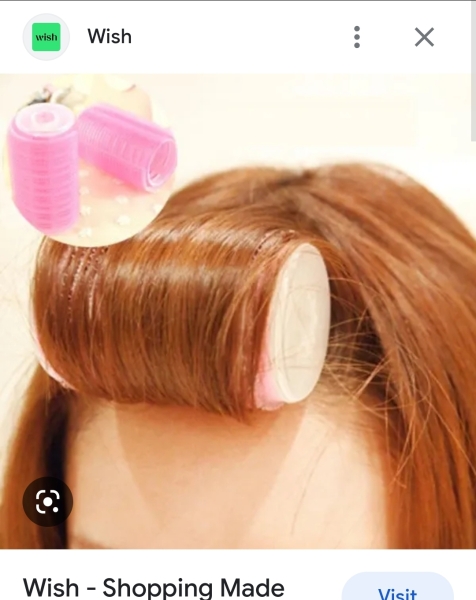 On holiday, and there's a lady here with a single hair curler