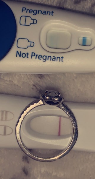 10 days late,pregnancy symptoms but negative tests