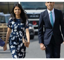 Who was that woman with Rishi Sunak just now at the palace?!