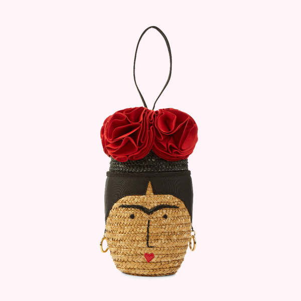 To have splurged on a novelty Kate spade bag....