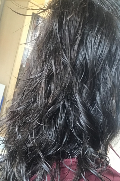 Frizzy sort of wavy hair