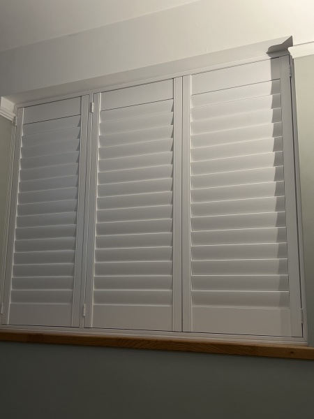 Wooden shutters in bedrooms 