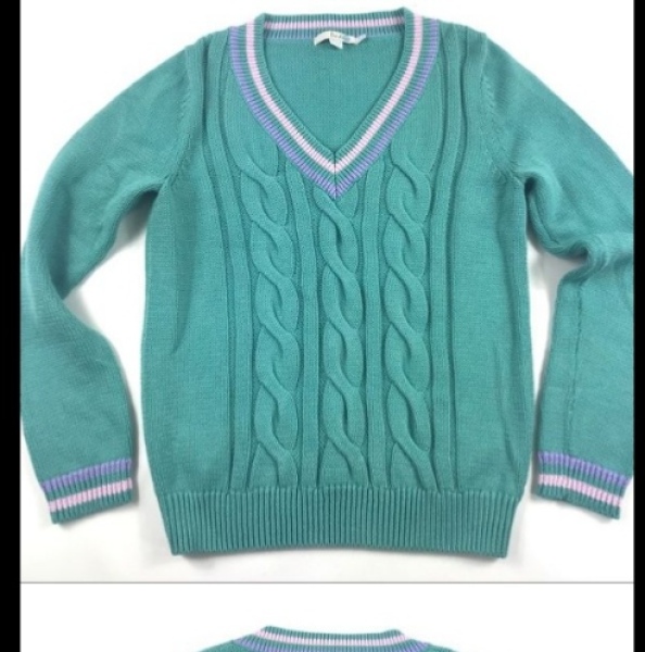 Diana’s oversized V-neck sweaters/ cricket jumpers in the crown