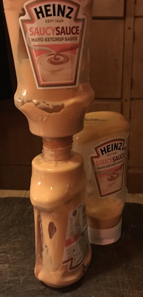 Trying to decant sauce from plastic bottles