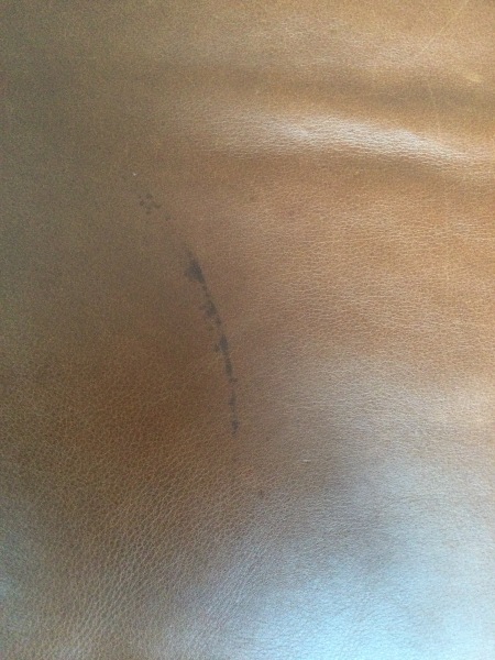 How do I get rid of this mark on a leather sofa?