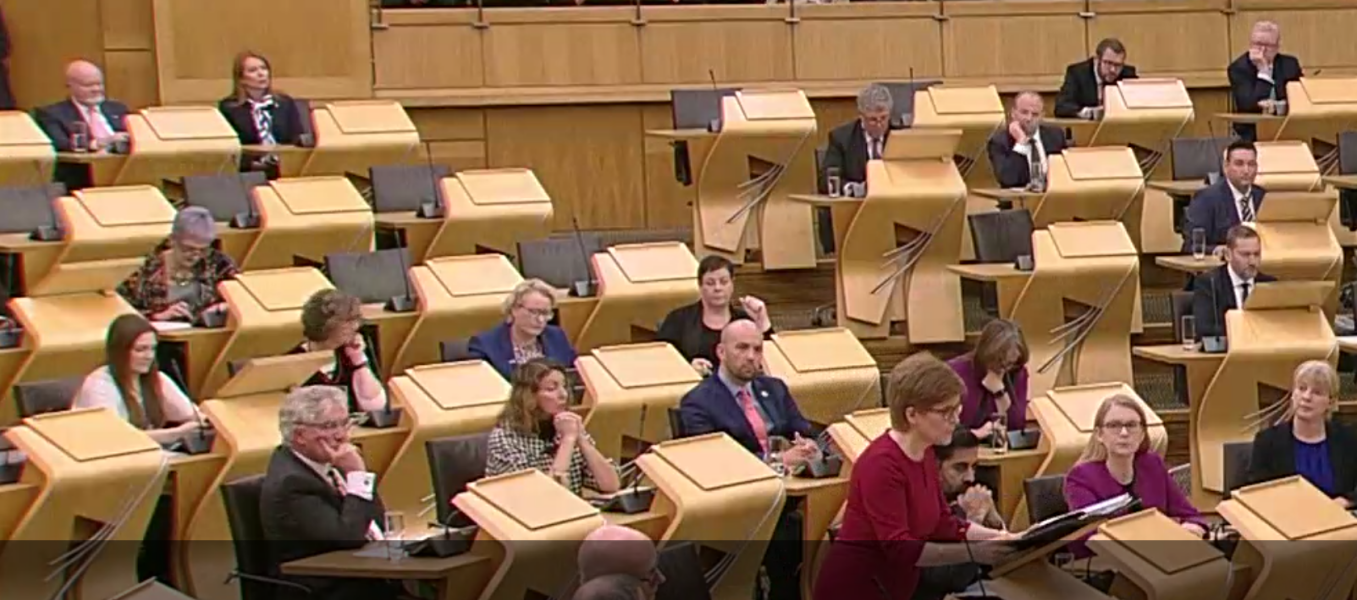 Another MP in suffragette colours! 