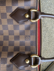 Anyone know anything about LV handbags? Need to know if this is real or fake. 