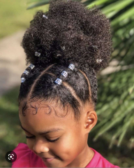 Aibu to think my child is called a boy because of her race
