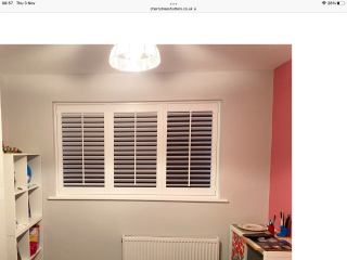 Wooden shutters in bedrooms 