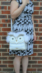 To have splurged on a novelty Kate spade bag....