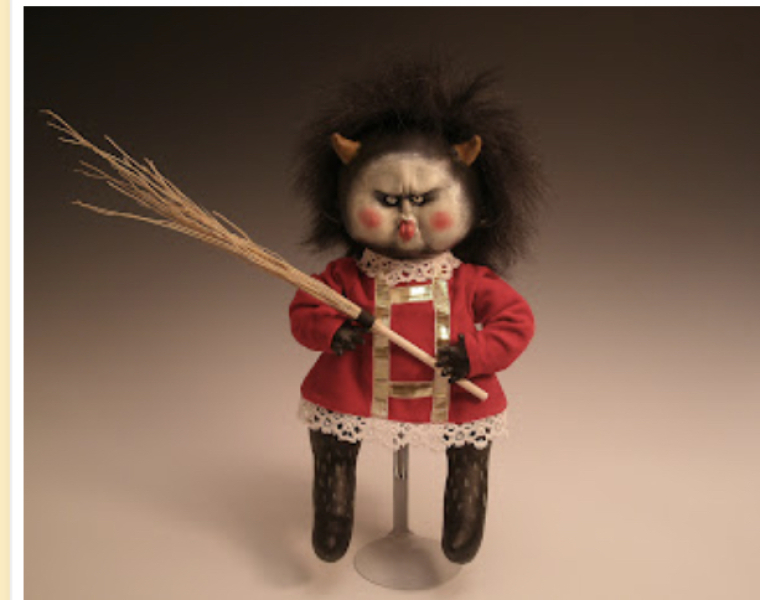 Weird dolls hanging on neighbours tree?