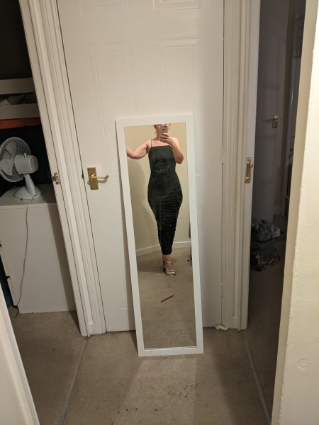 Wearing an unflattering outfit to a party 
