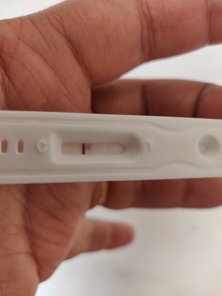 12 DPO faint line - am I pregnant?