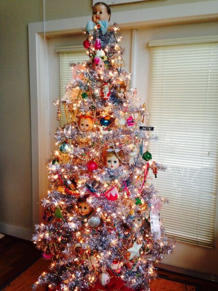 Weird dolls hanging on neighbours tree?