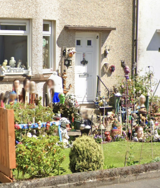 Weird dolls hanging on neighbours tree?