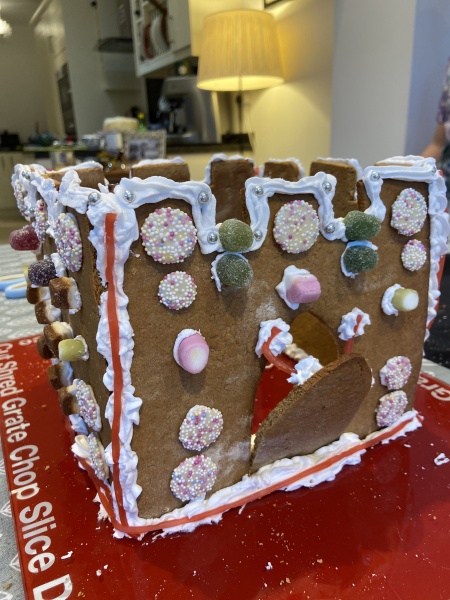 Anyone want to share gingerbread house pics? 