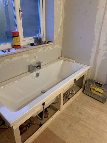 Plumber damaged bath while fitting it
