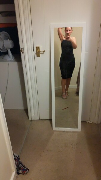 Wearing an unflattering outfit to a party 