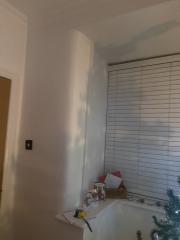 How can I fit curtains on this window? 