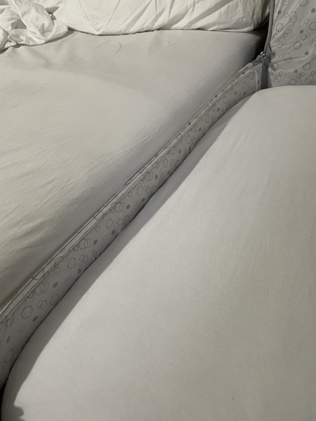 Can I stack two mattresses in newborn cot?