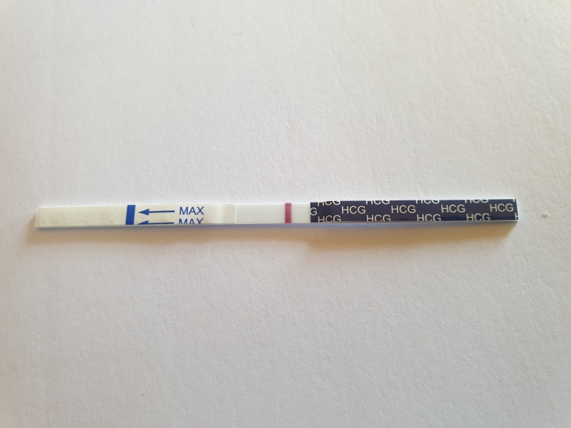12 dpo. Anyone see a v faint line please?!