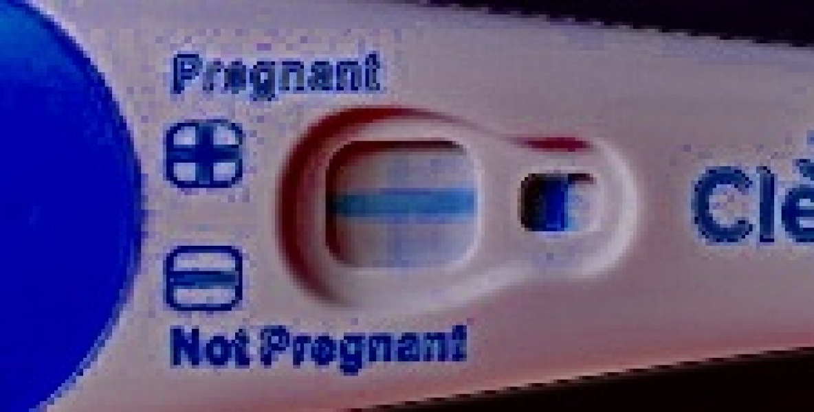 12 dpo. Anyone see a v faint line please?!
