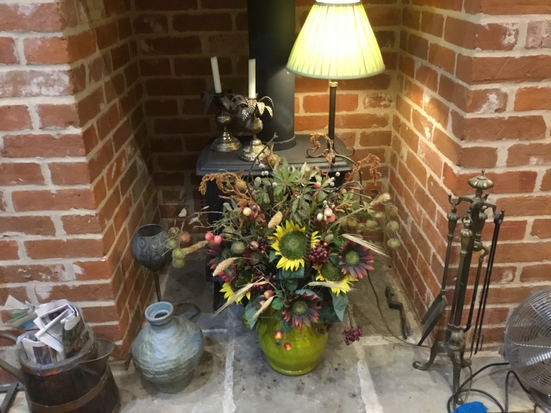 How can I make this ugly fireplace look better?