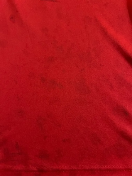 Mystery weird marks on DC PE t-shirt. Detergent stains?