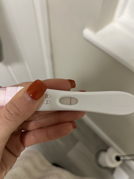 BFP but light brown discharge 