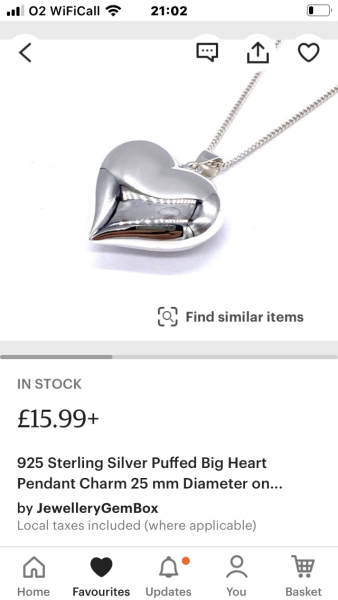 Silver puff heart with leather cord necklace