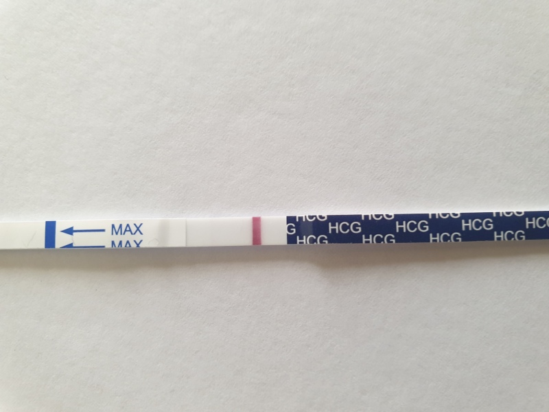 12 dpo. Anyone see a v faint line please?!