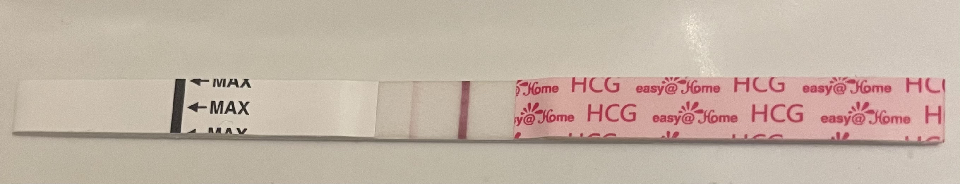 12 dpo. Anyone see a v faint line please?!