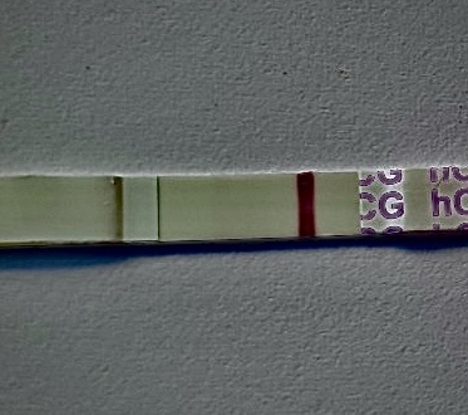 12 dpo. Anyone see a v faint line please?!