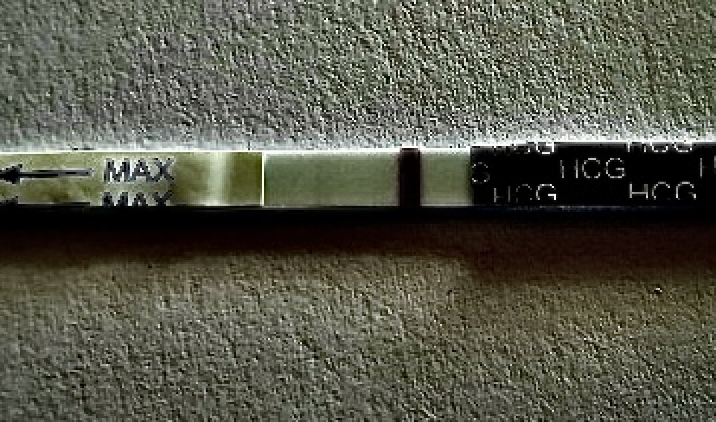 12 dpo. Anyone see a v faint line please?!
