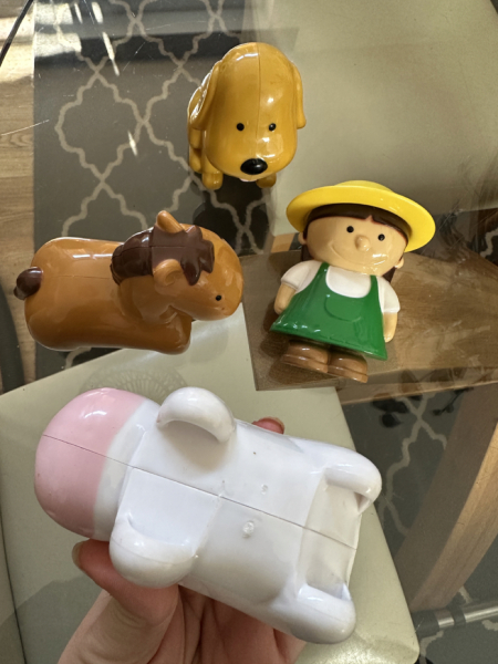 Can anyone help me identify the brand of these toy farm animals please?